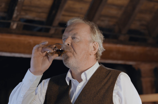 John McDonald sipping a dram