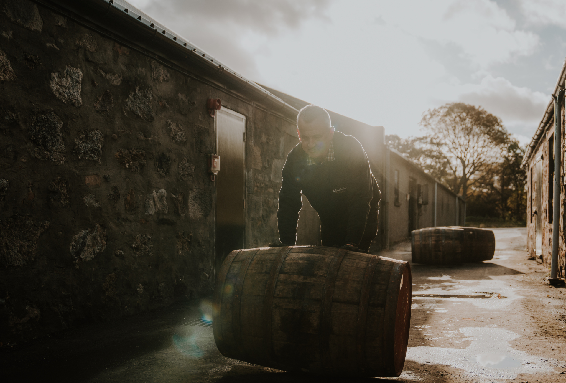 Balblair Distillery rolling of barrel Landscape